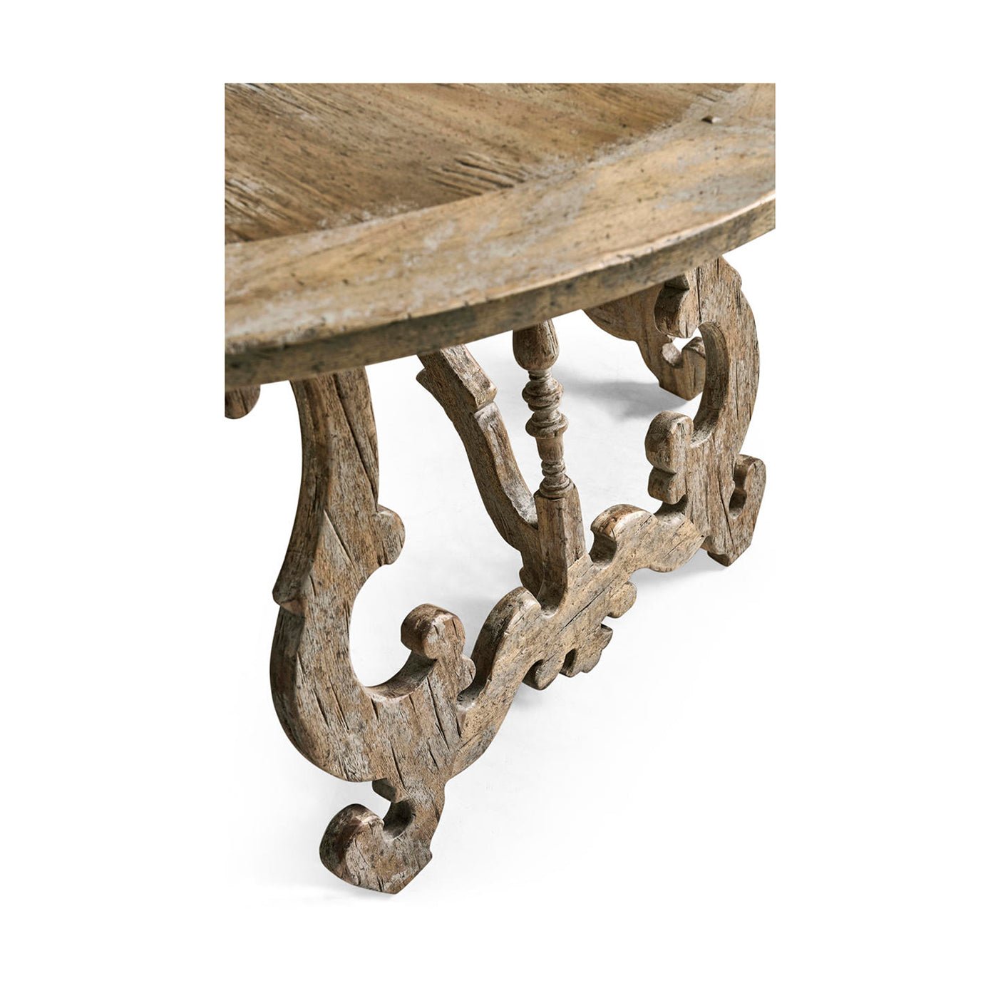 Detailed leg design on oak center table, close-up.