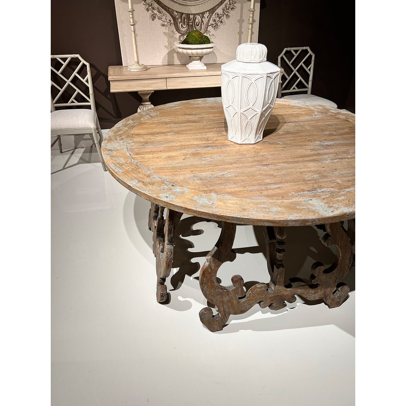Rustic center table with vase, close-up perspective.