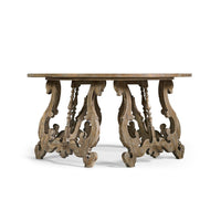Oak center table with intricate carved legs, side profile.