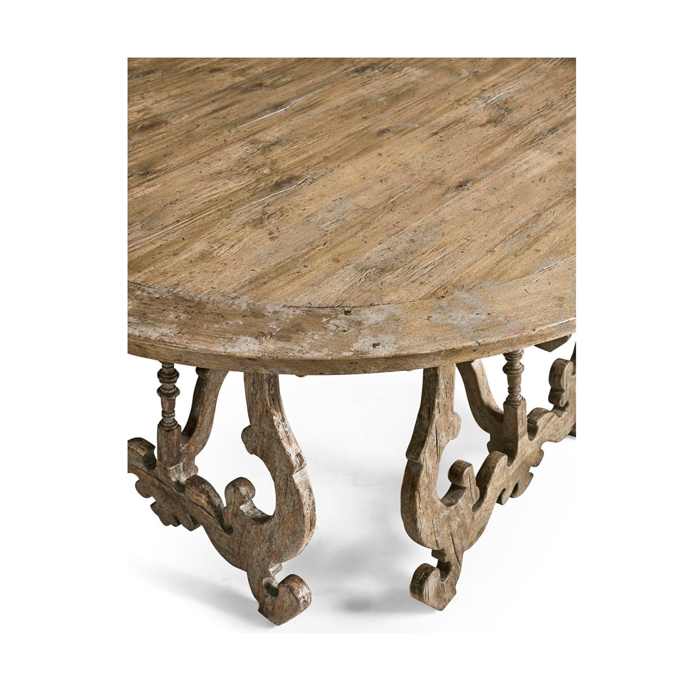 Close-up of round center table surface and legs.