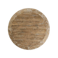 Top view of round oak center table surface.