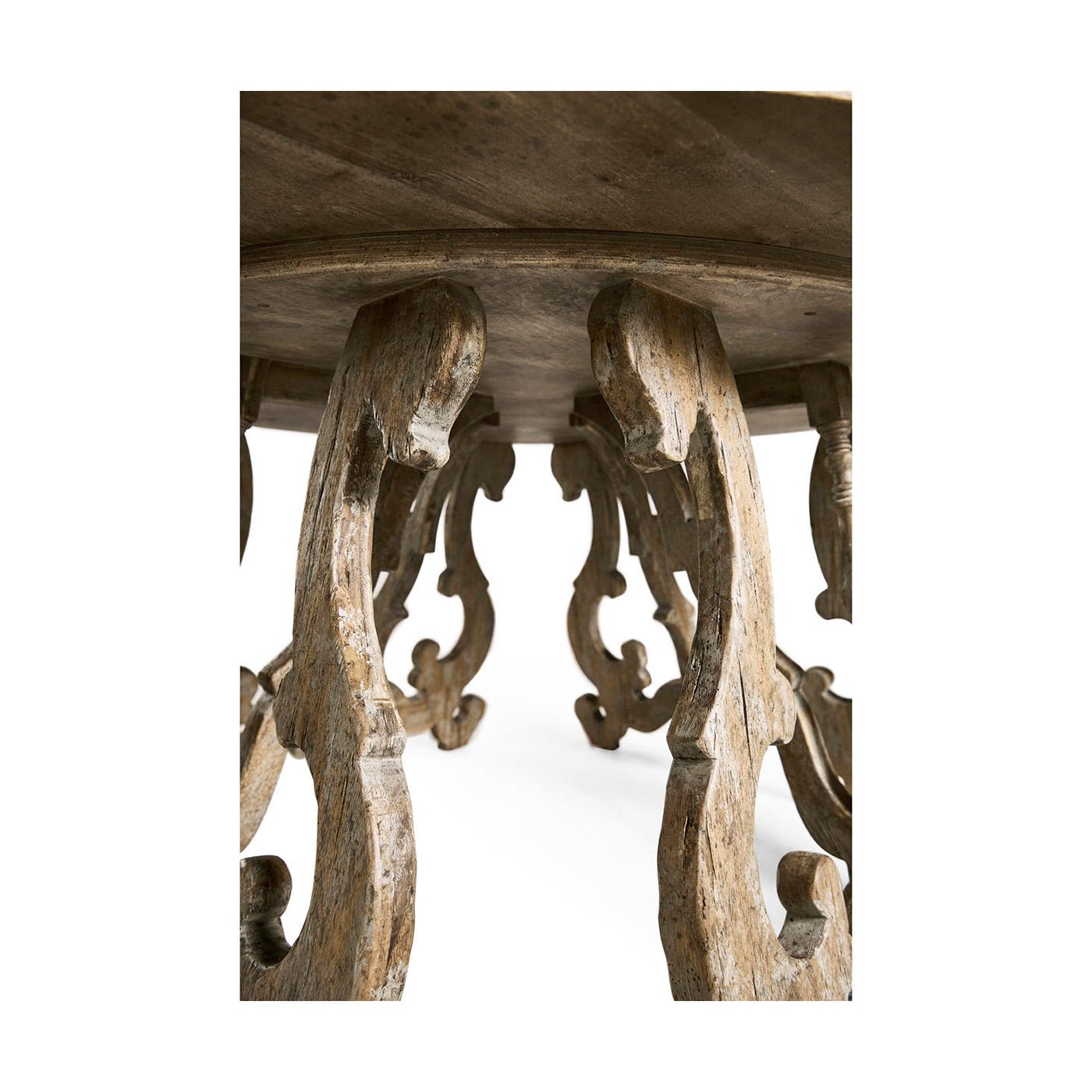 Interior view of ornate leg design on center table.