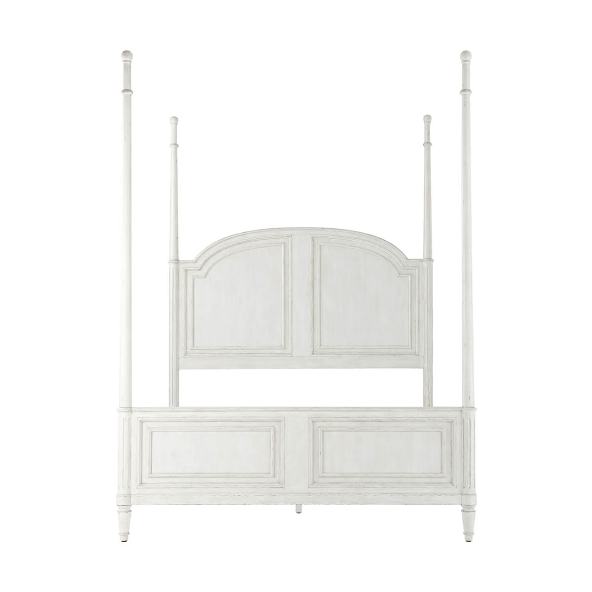 Rustic queen bed with tall posts, head-on view.