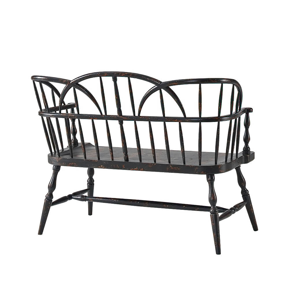 Hoop back bench, rear view, arched spindles highlighted.