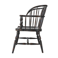 Side view of rustic hoop back bench, detailed legs.