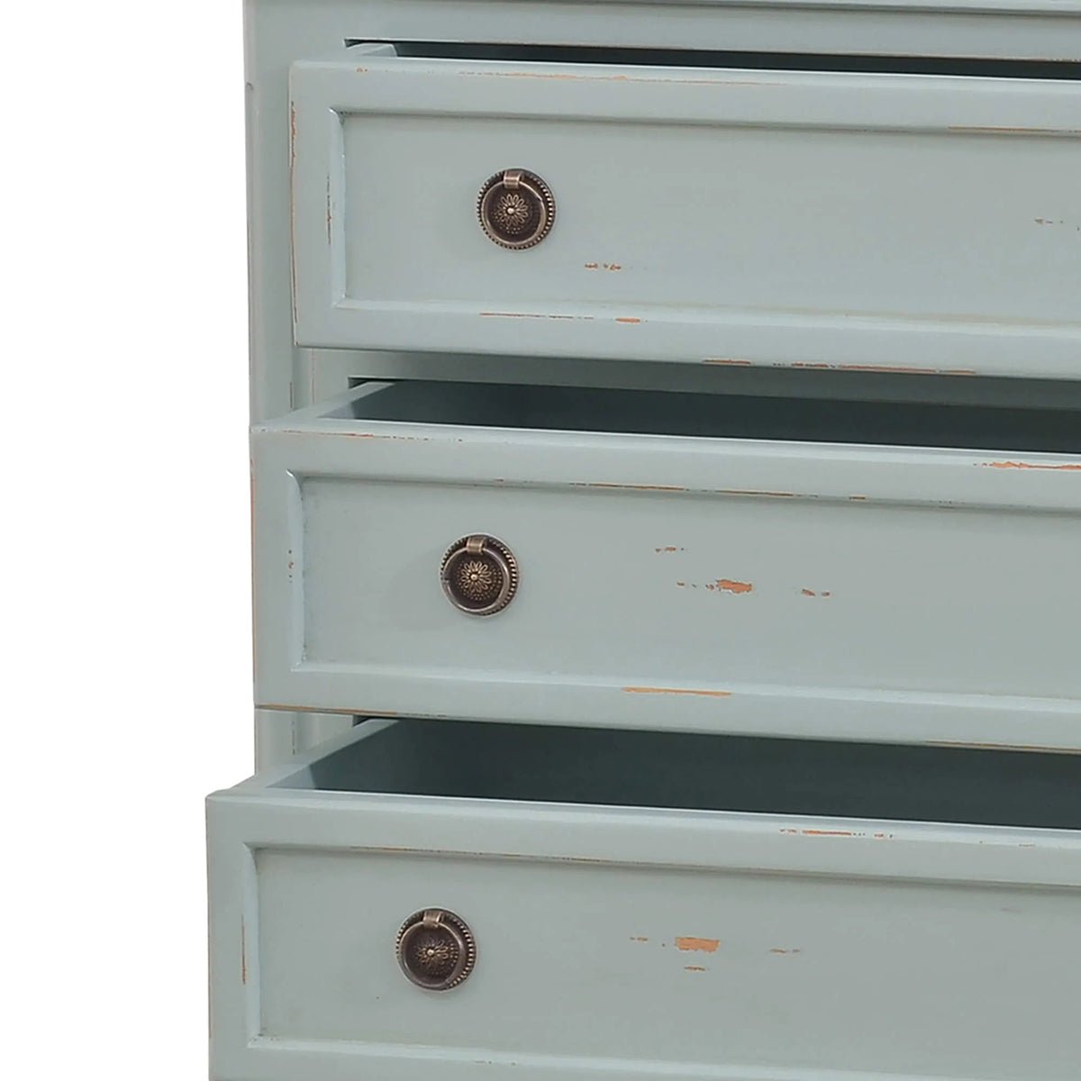 Close-up, nightstand, open drawers with detailed handles.