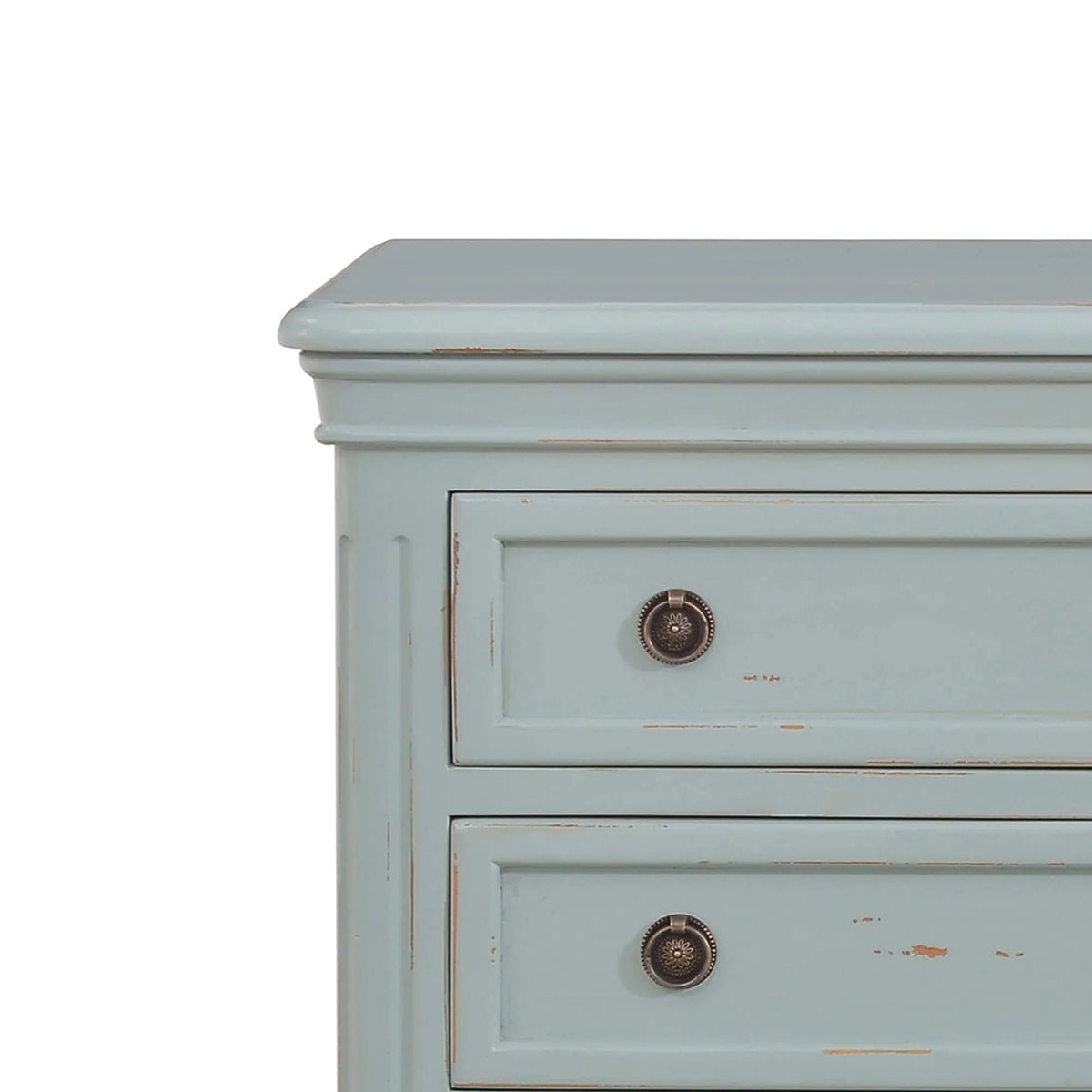 Close-up, nightstand upper section, two closed drawers.