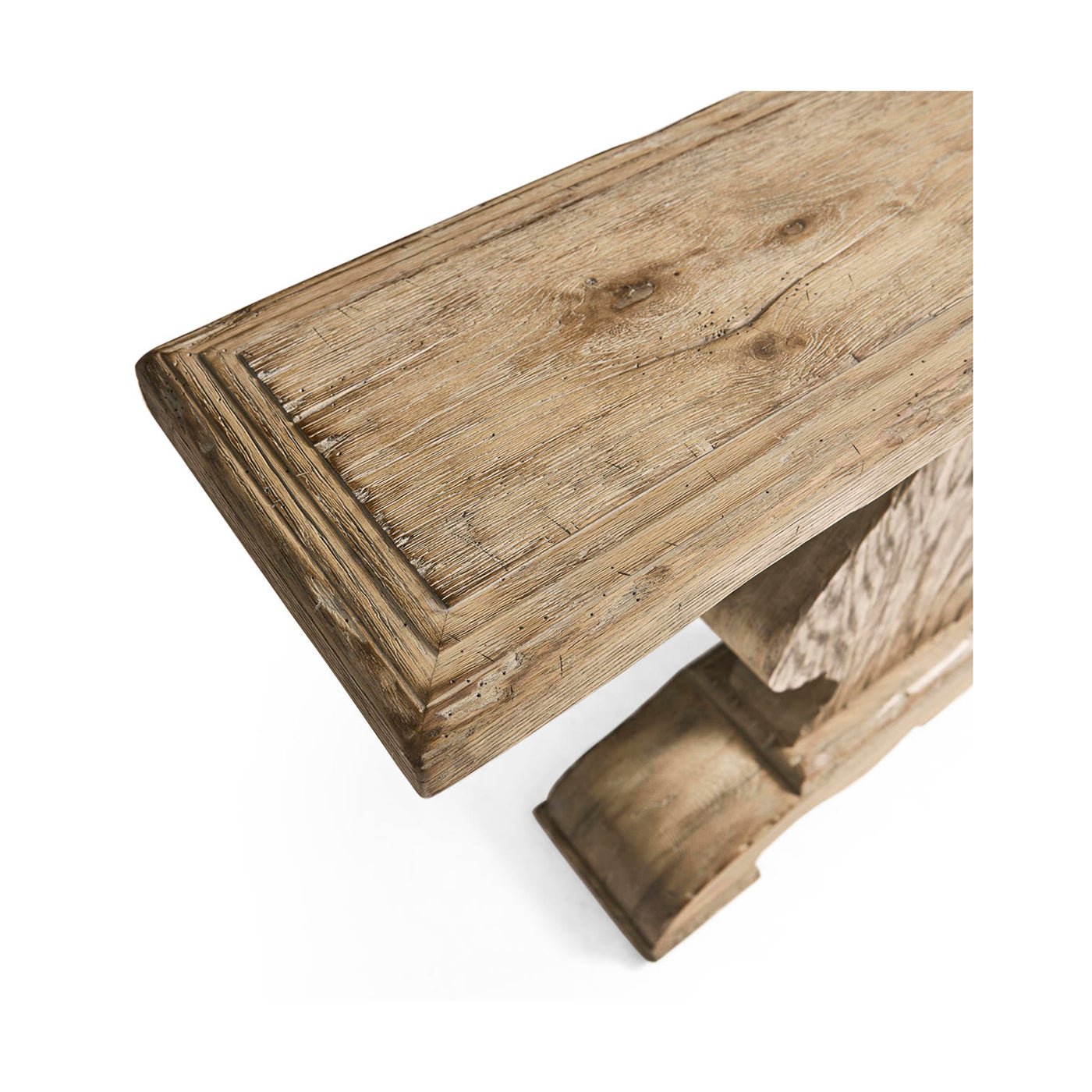 Angled close-up of console table's textured wood surface.
