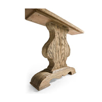 Close-up of console table's ornate pedestal support base.