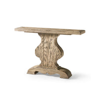 Rustic pedestal console table side view against white background.