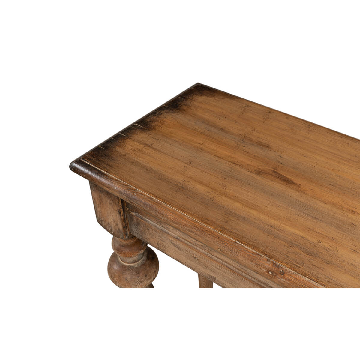 Close-up of tabletop corner on rustic pine console table.