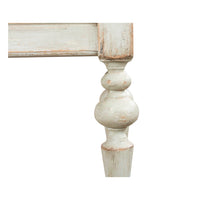 Rustic sage console table ornate leg detail.
