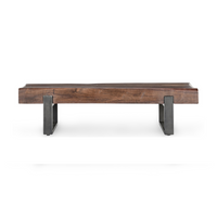 Front view of the reclaimed wood bench showing the thick seat and dark iron supports inset from the ends