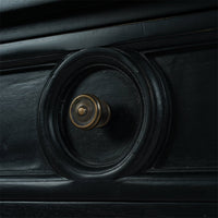 Rustic black end table drawer knob close-up