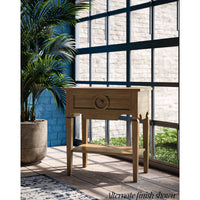 Rustic end table in bright interior with plants.