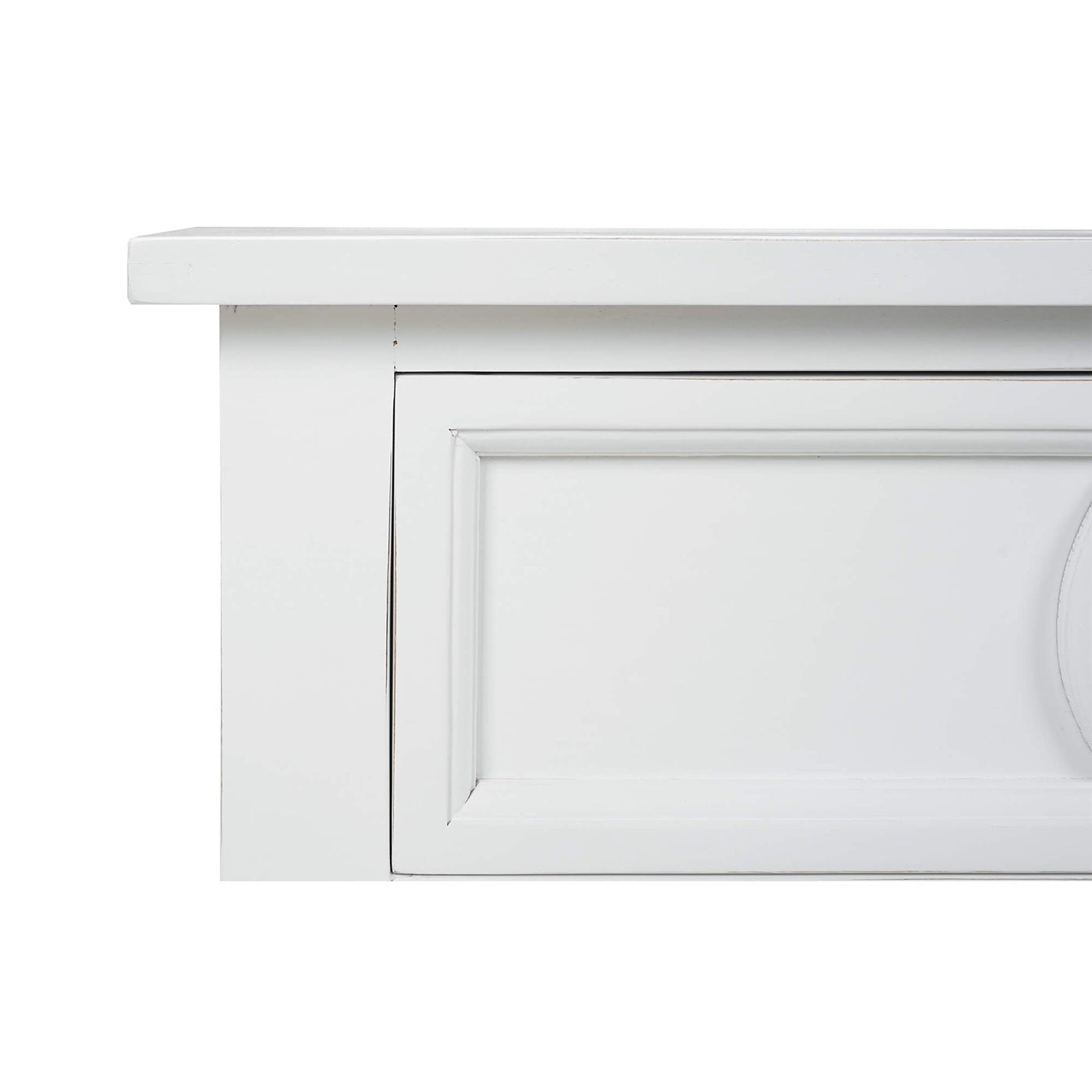 White end table, close-up of side panel and drawer.