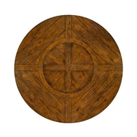 Top view of rustic walnut round dining table surface.