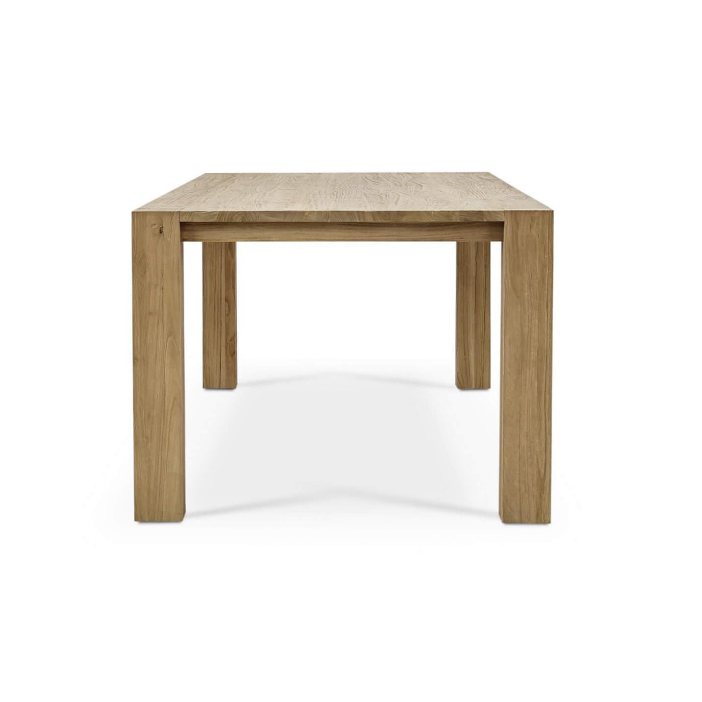 End view of teak dining table, simplicity captured