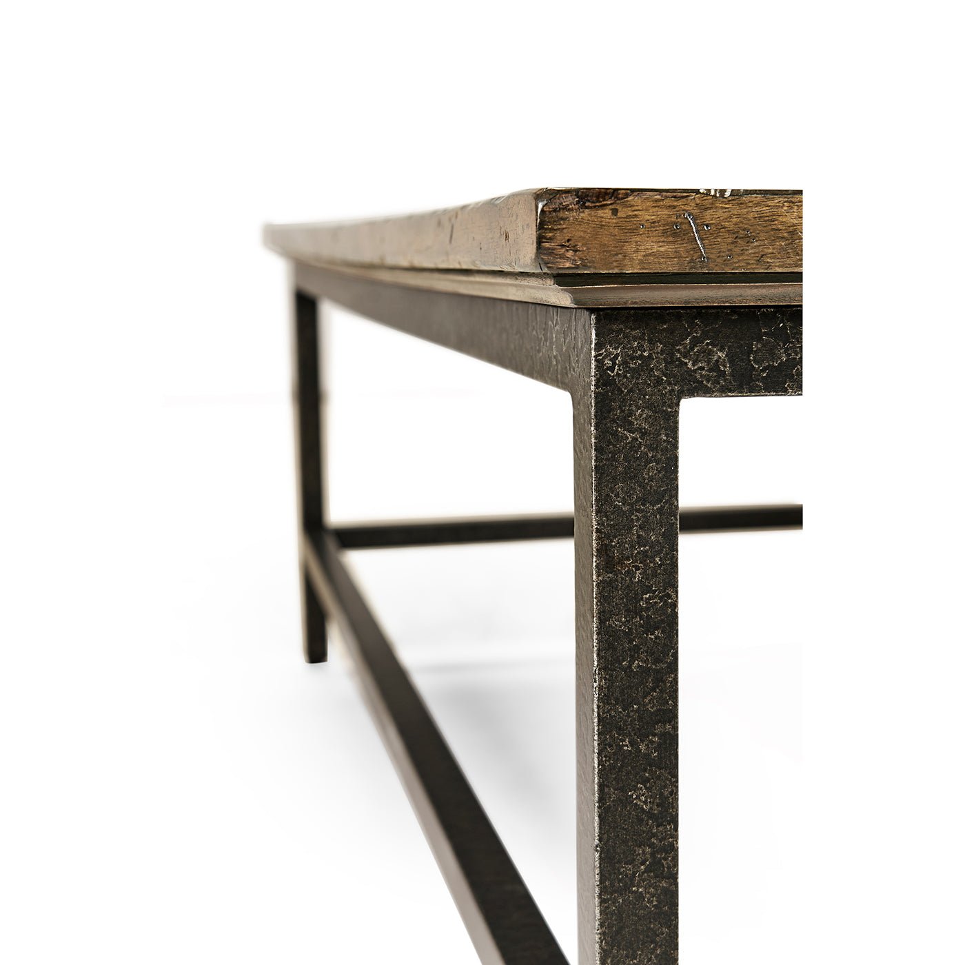 Rustic square coffee table, close-up of metal frame corner.