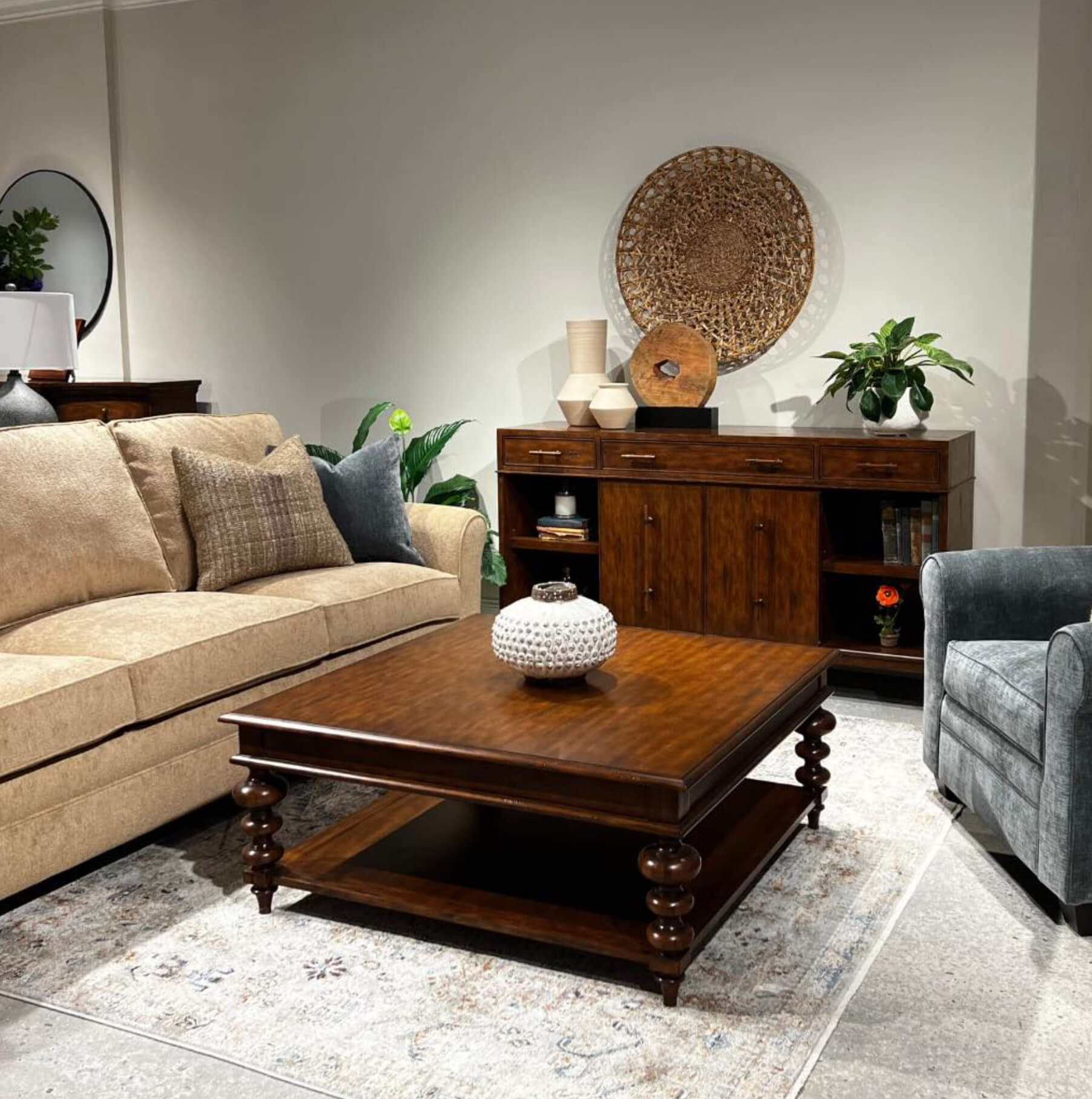 Coffee table with decor, in cozy living room setting.