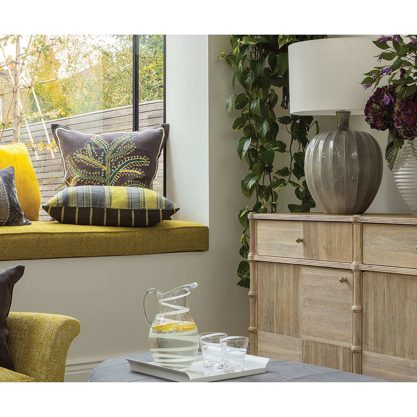 Rustic buffet sideboard in cozy sitting area.