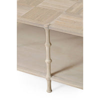 Rustic washed coffee table close-up, middle leg structure.