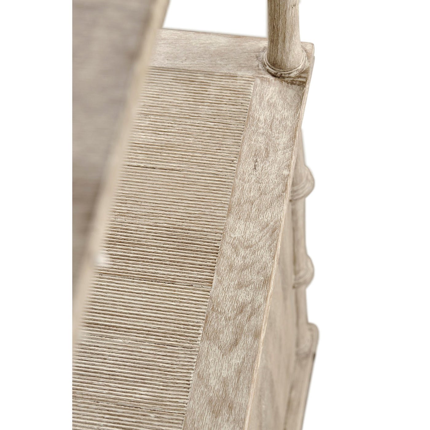 Angled view of textured side on rustic etagere.