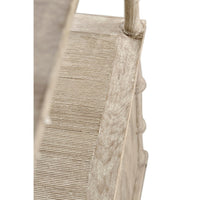 Angled view of textured side on rustic etagere.
