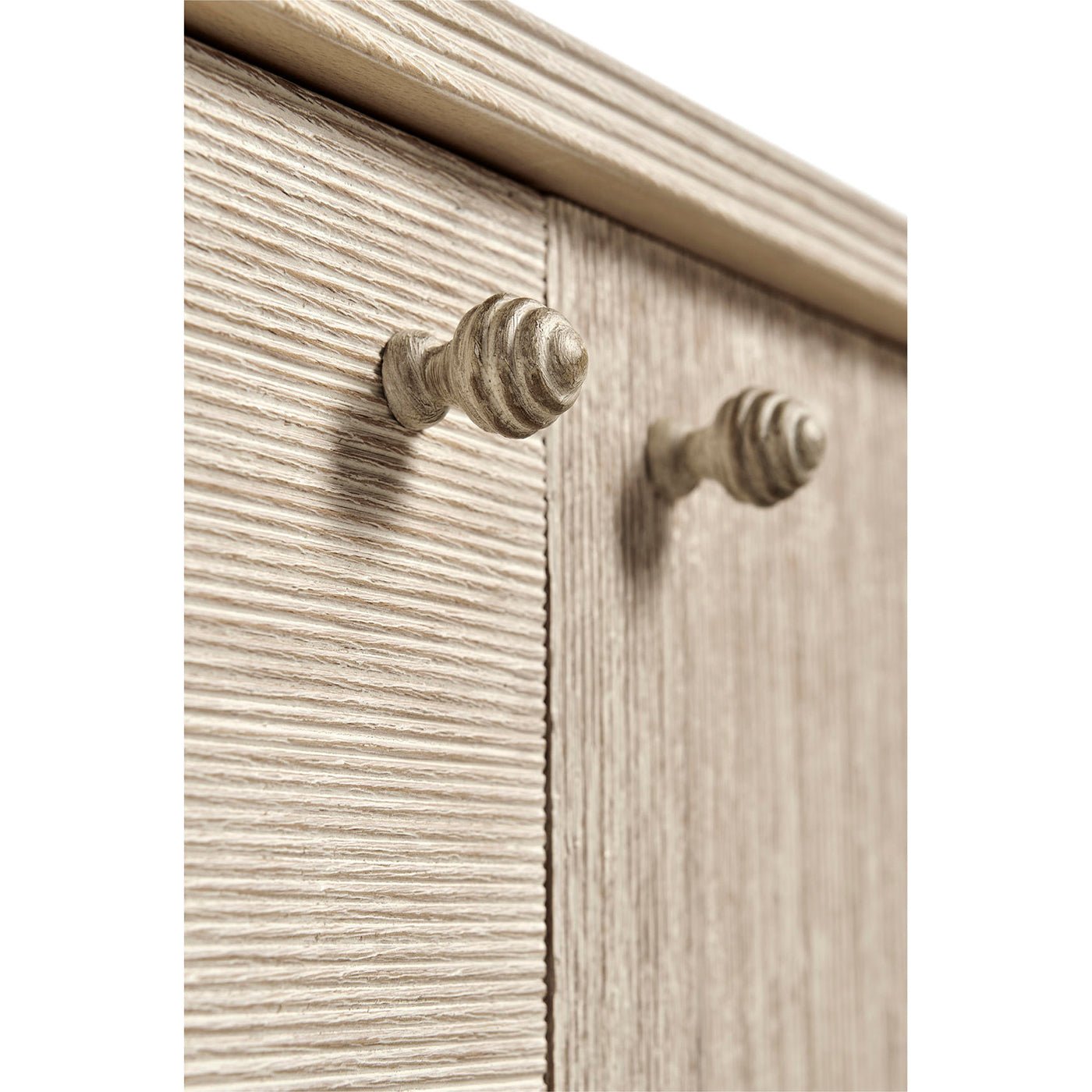 Close-up of textured knobs on the etagere cabinet.