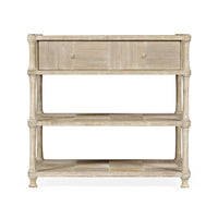 Front view of rustic washed nightstand with shelves.