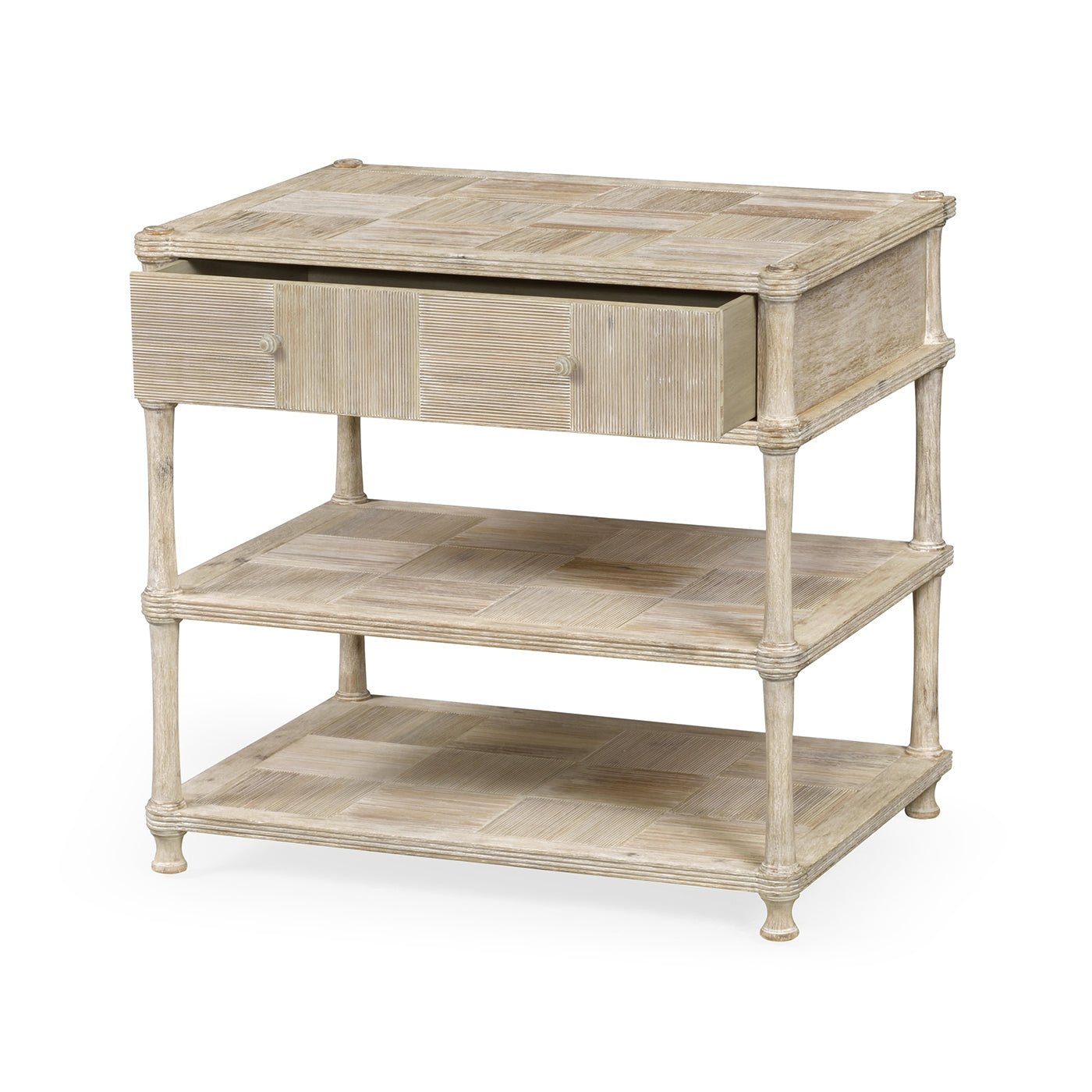 Rustic washed nightstand showing open top drawer.