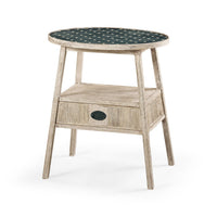 Rustic washed oval end table with polka dot top.