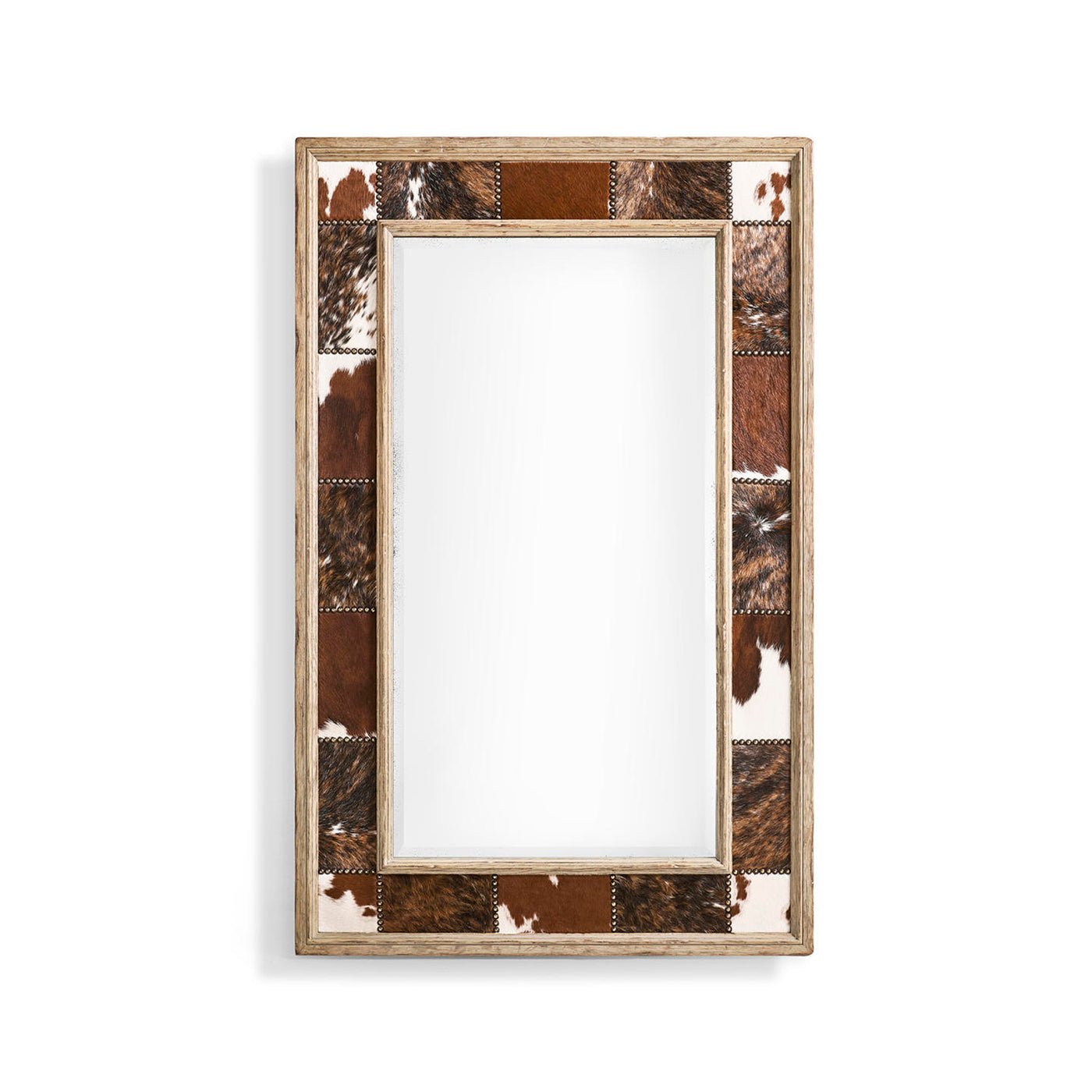 Rustic cowhide inlay wall mirror on white background.