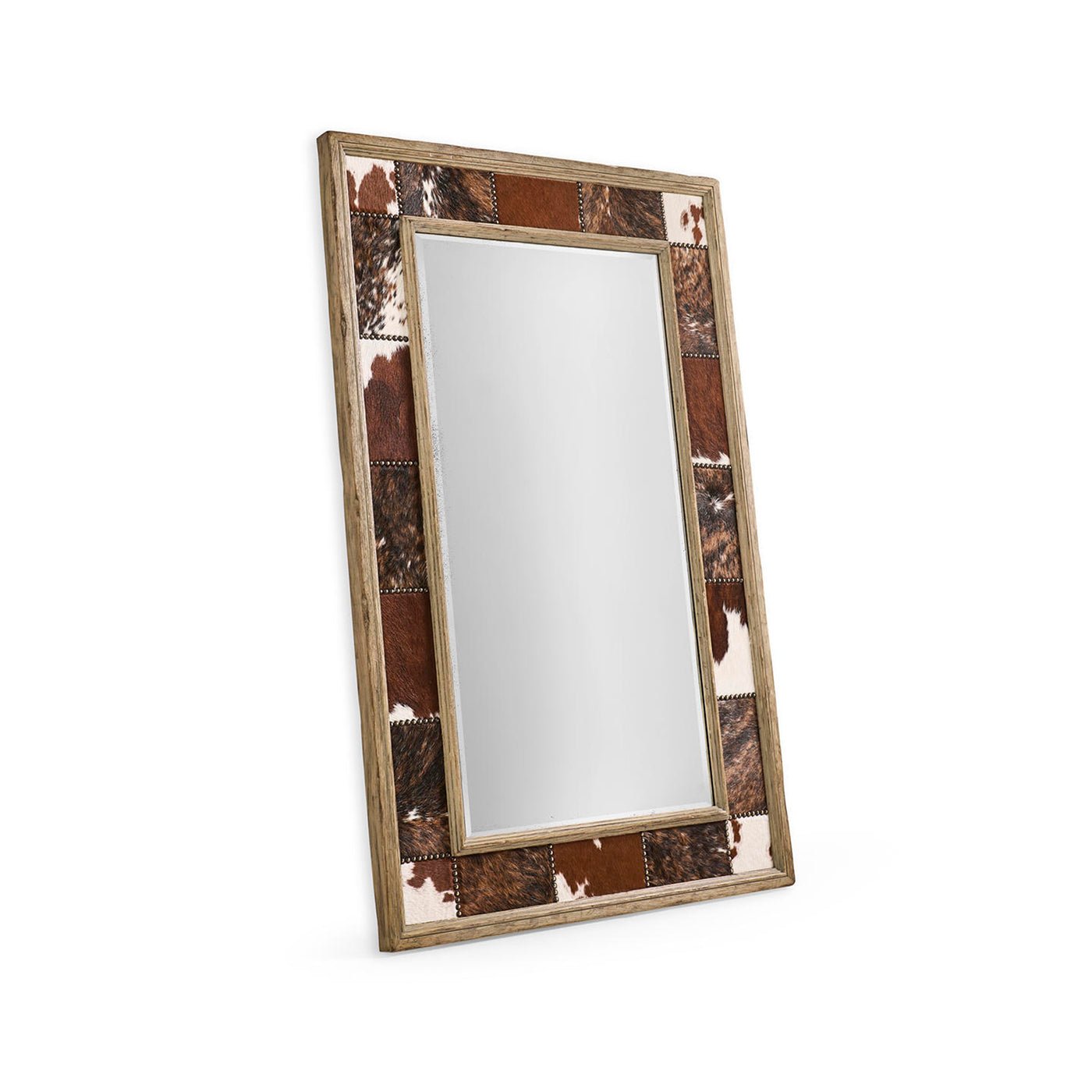 Angled view of rustic cowhide wall mirror.