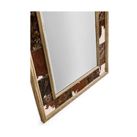 Side angle highlighting cowhide and wooden mirror design.