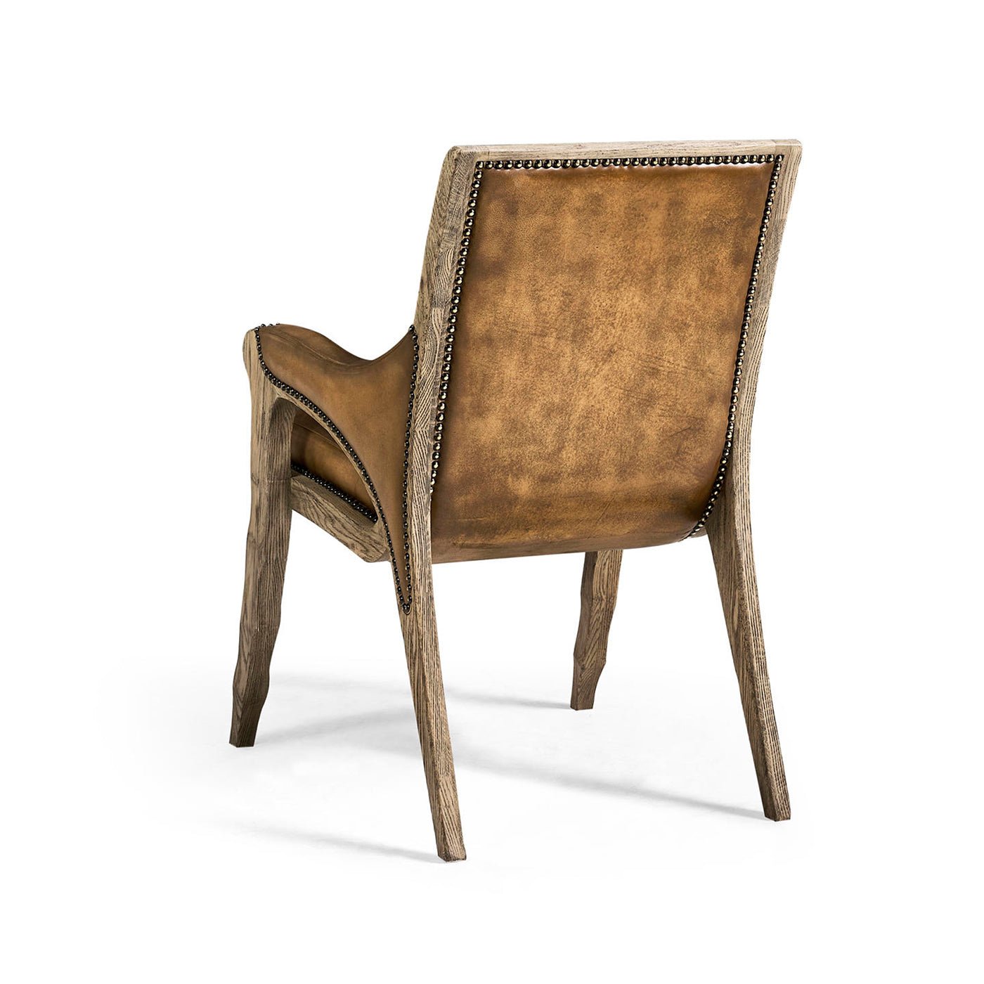 Rustic leather armchair, rear three-quarter view.