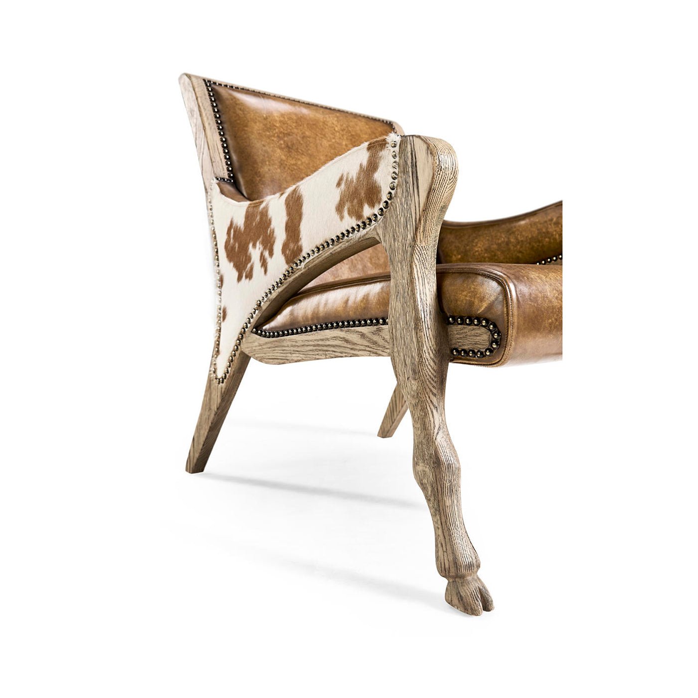 Side angle showing leather chair's wood and cowhide design.