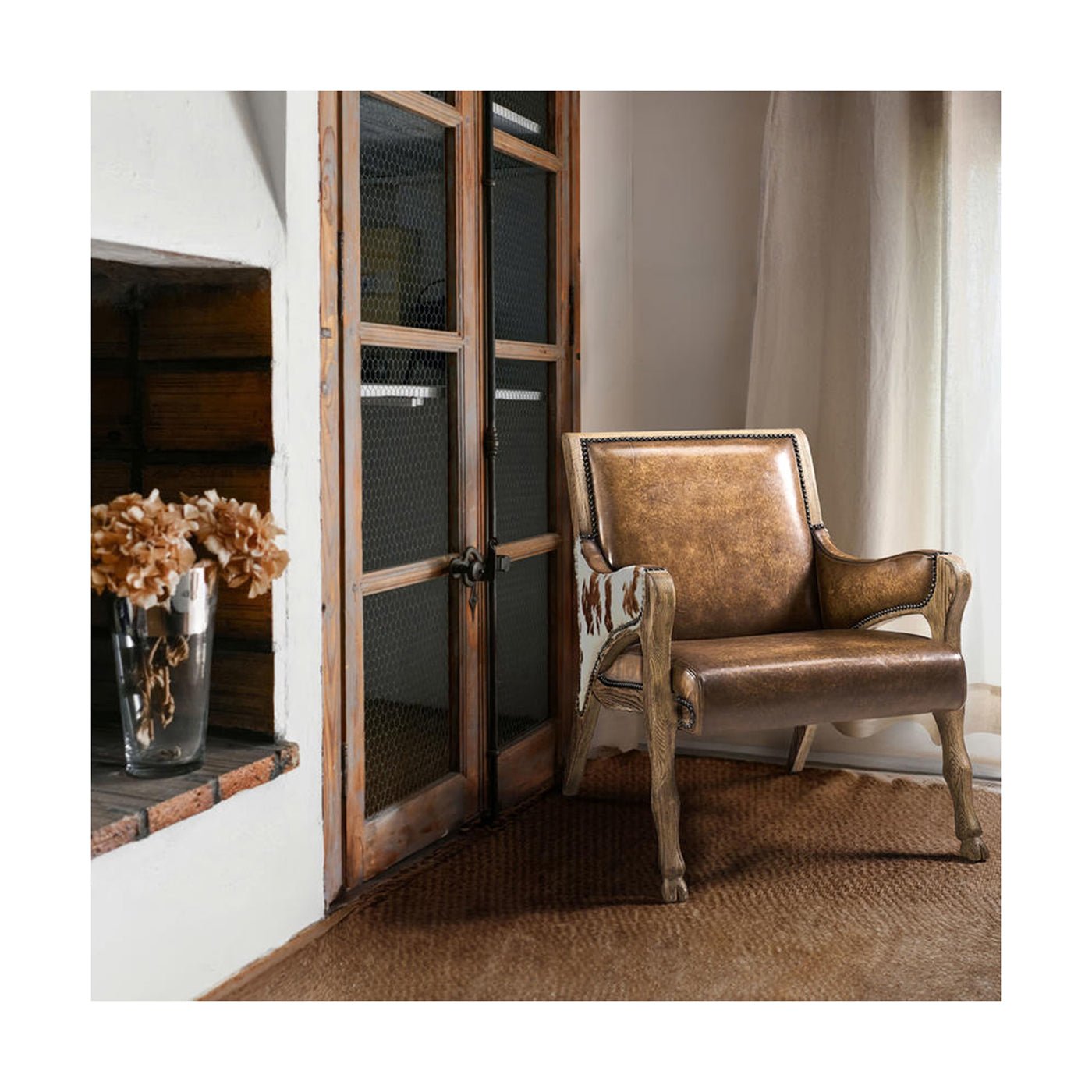 Leather accent chair in rustic living room setting.