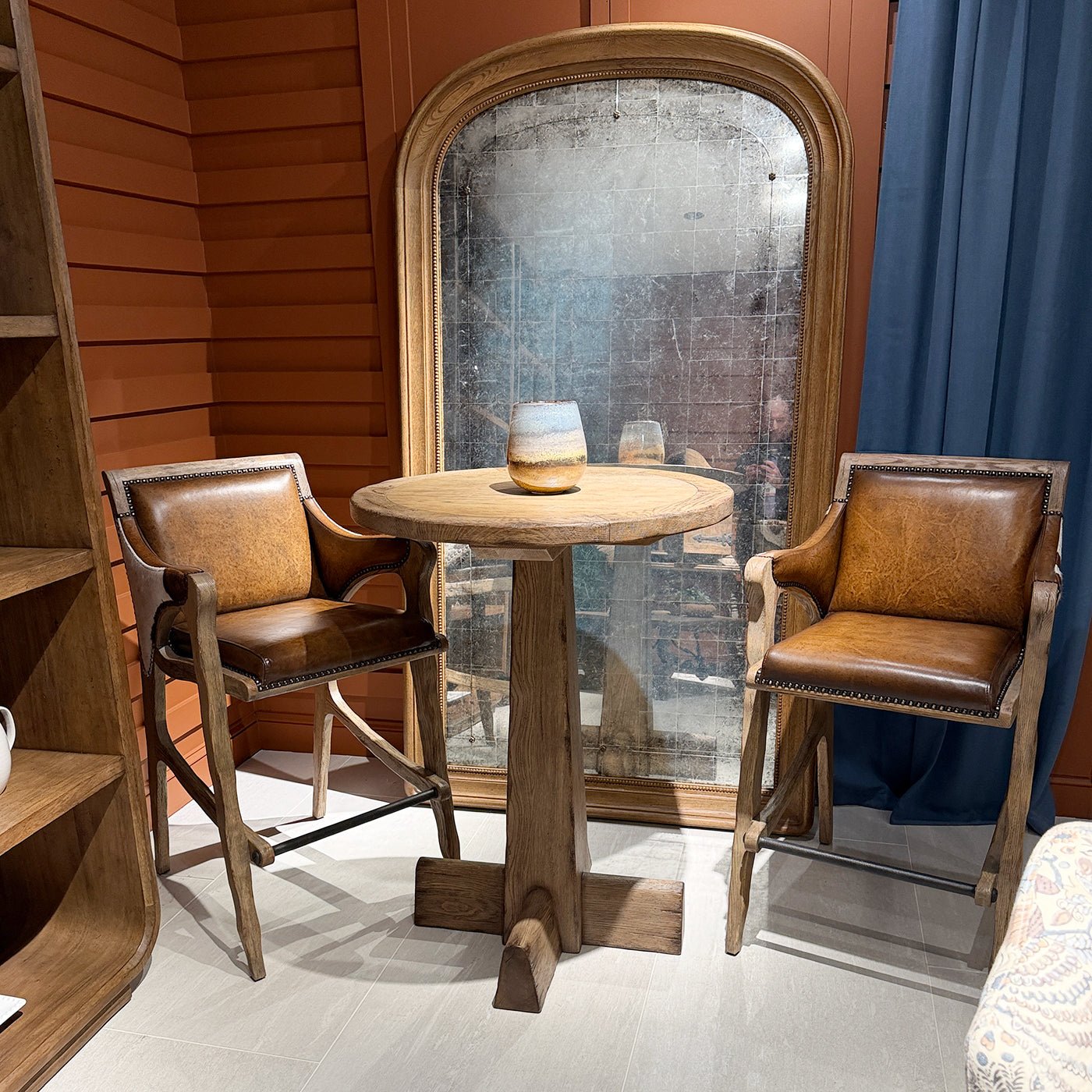 Rustic Western bar stools with table, home setting.