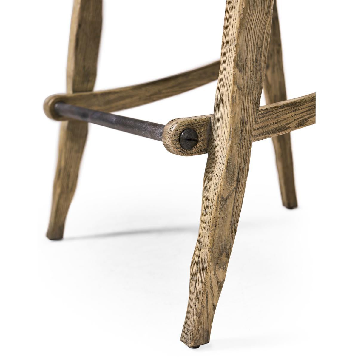 Rustic Western bar stool, lower leg detail, wooden structure.