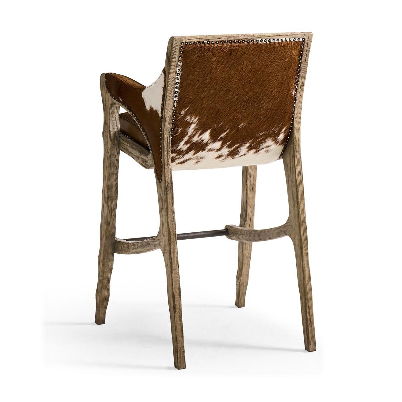 Back view of Rustic Western bar stool, cowhide detail.