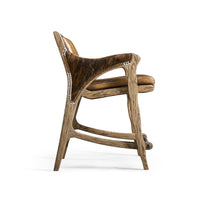 Side view of rustic counter stool with wooden legs.