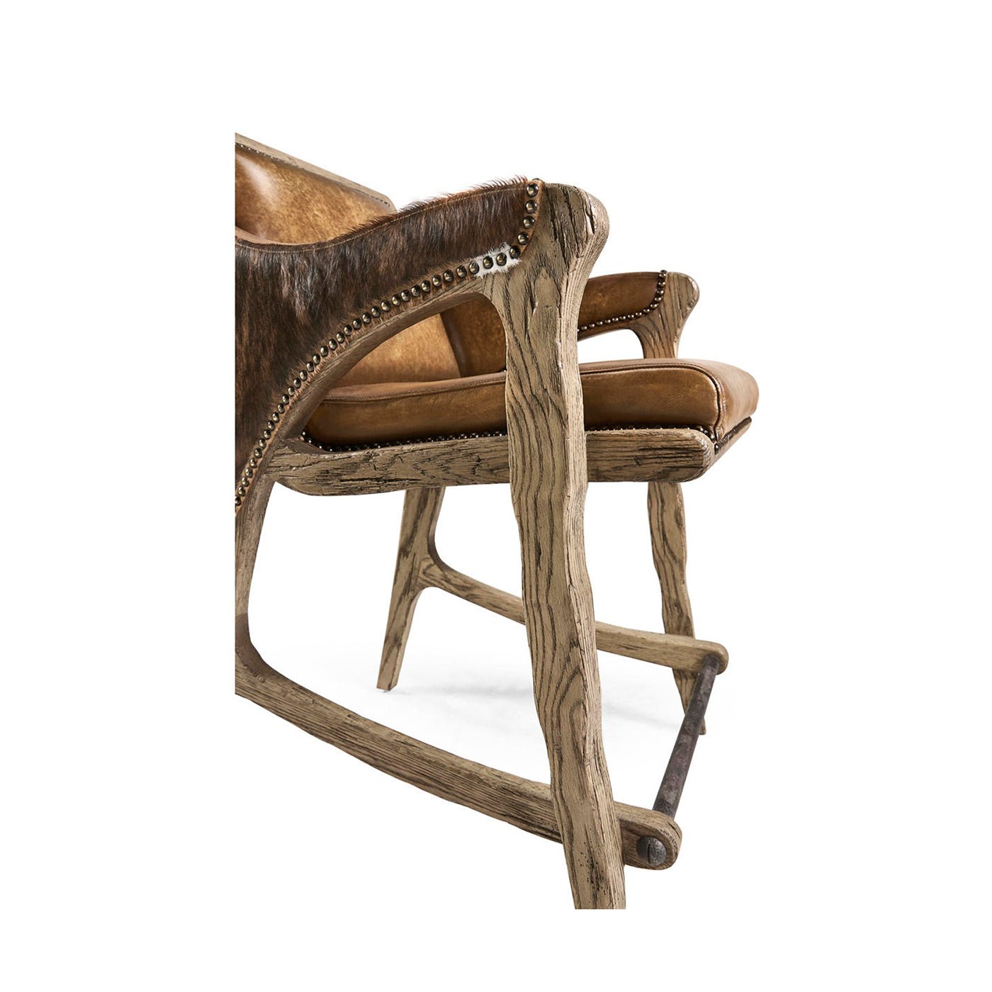 Close-up of rustic stool side with leather and hide.