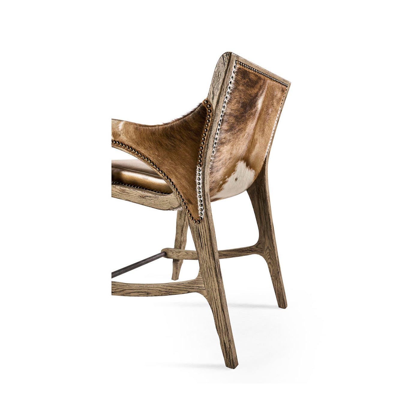Back angle of rustic stool highlighting hide and wood detail.