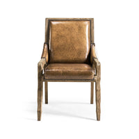 Front view rustic western chair with leather cushion.