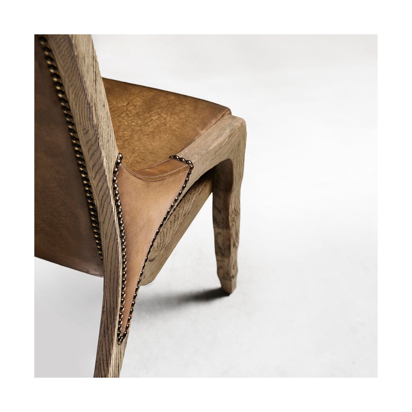 Close-up side view, leather seat and wooden frame detail