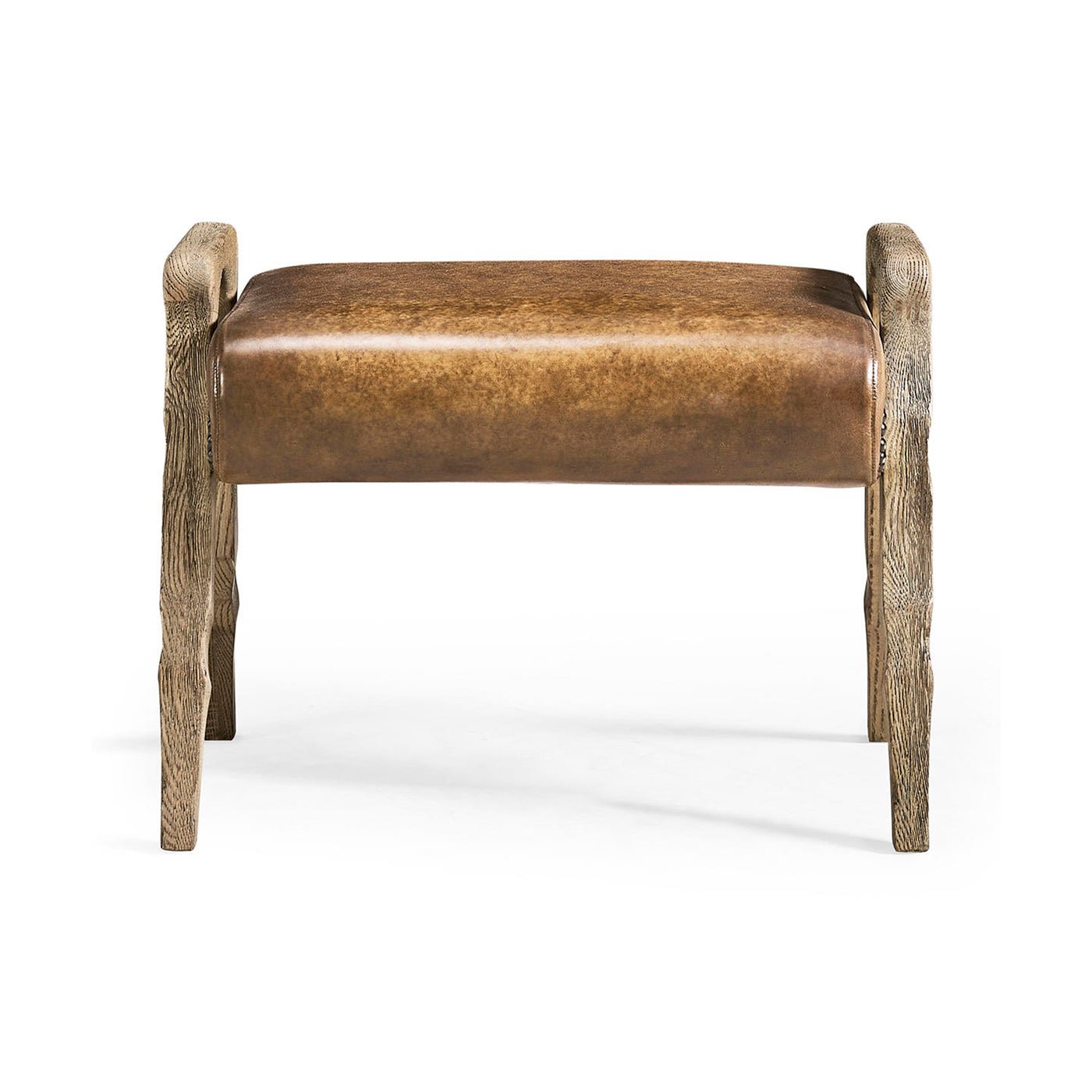 Rustic leather footstool, straight front view of seat.