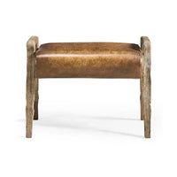 Rustic leather footstool, straight front view of seat.