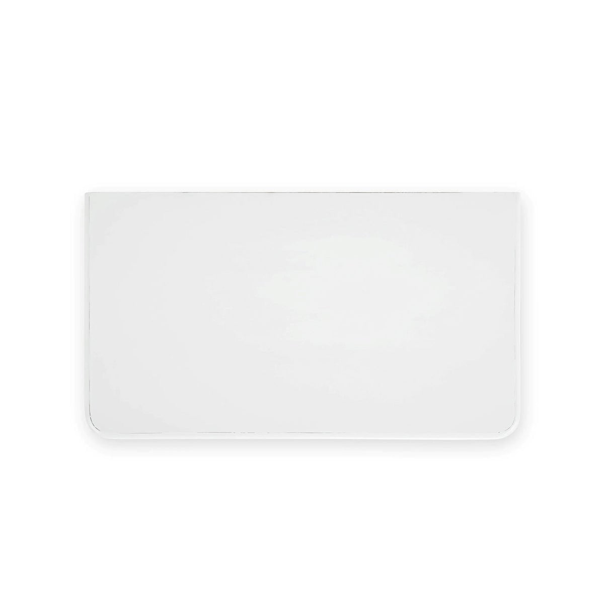 Top view of white nightstand, smooth surface visible.