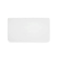 Top view of white nightstand, smooth surface visible.